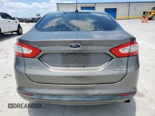 2013 Ford Fusion SE Hybrid with VIN 3FA6P0LU8DR261232, listed as a Copart auction lot 60674105 with 132,901 mi miles and Clean title. Bid and sale history available at DreamBid. Image 6.