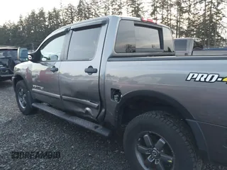 2014 Nissan Titan S with VIN 1N6AA0EC4EN500528, listed as a IAAI auction lot 41323510 with 31,164 mi miles and . Bid and sale history available at DreamBid. Image 15.