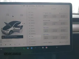 2023 Tesla Model Y Long Range z VIN 7SAYGAEEXPF789037, wystawiony jako IAAI lot #41551605 z przebiegiem 8 630 mil mil oraz . Historia ofert i sprzedaży dostępna na DreamBid. Obrazek 7.