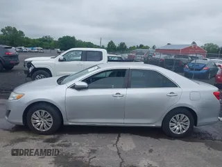 2012 Toyota Camry L z VIN 4T4BF1FK0CR157600, wystawiony jako IAAI lot #42438078 z przebiegiem 94 310 mil mil oraz . Historia ofert i sprzedaży dostępna na DreamBid. Obrazek 14.