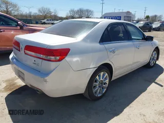 2012 Lincoln MKZ with VIN 3LNHL2GC2CR813653, listed as a IAAI auction lot 41751793 with 216,961 mi miles and . Bid and sale history available at DreamBid. Image 4.