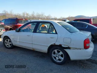 2001 Mazda Protege LX with VIN JM1BJ225710406286, listed as a IAAI auction lot 41887127 with Not Provided miles and . Bid and sale history available at DreamBid. Image 6.