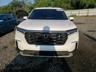 2024 Honda Pilot EX-L 7 Passenger with VIN 5FNYG2H56RB012792, listed as a Copart auction lot 67258824 with 2,821 mi miles and Salvage Title. Bid and sale history available at carsss.com. Image 11.