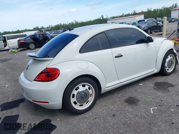 2015 Volkswagen Beetle Fleet Edition with VIN 3VWF17AT2FM656714, listed as a IAAI auction lot 42698040 with 72,348 mi miles and . Bid and sale history available at DreamBid. Image 4.