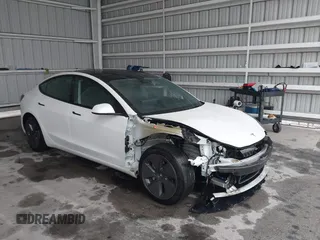 2023 Tesla Model 3 with VIN 5YJ3E1EA9PF548726, listed as a IAAI auction lot 42345157 with 30,647 mi miles and . Bid and sale history available at DreamBid. Image 1.