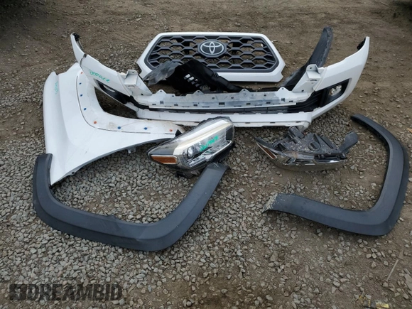 2018 Toyota Tacoma SR z VIN 3TMCZ5AN5JM181489, wystawiony jako Copart lot #55696365 z przebiegiem 70 091 mil mil oraz Szkoda całkowita • Salvage title. Historia ofert i sprzedaży dostępna na DreamBid. Obrazek 12.
