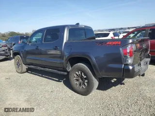 2020 Toyota Tacoma 4WD SR5 with VIN 3TMCZ5AN9LM302379, listed as a Copart auction lot 46530975 with 30,558 mi miles and Salvage Title. Bid and sale history available at carsss.com. Image 2.