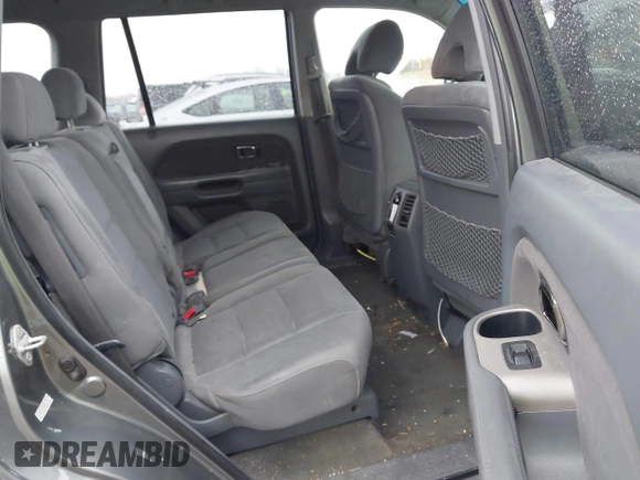 2008 Honda Pilot SE with VIN 5FNYF18398B001764, listed as a IAAI auction lot 41865212 with 355,052 mi miles and . Bid and sale history available at DreamBid. Image 8.