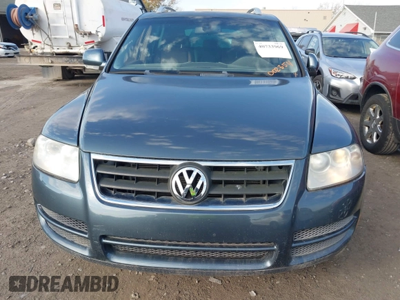 2007 Volkswagen Touareg V6 z VIN WVGZE77LX7D002354, wystawiony jako IAAI lot #40733969 z przebiegiem 106 526 mil mil oraz . Historia ofert i sprzedaży dostępna na DreamBid. Obrazek 6.