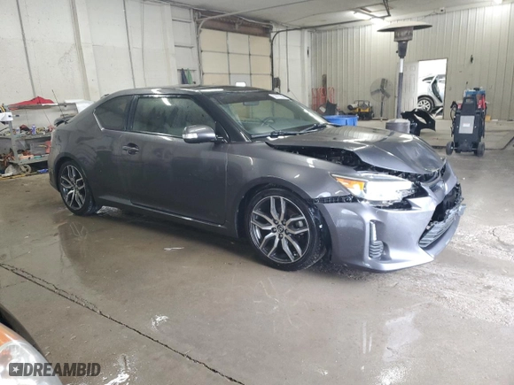 2015 Scion tC with VIN JTKJF5C70FJ002254, listed as a Copart auction lot 53077385 with 117,221 mi miles and Salvage Title. Bid and sale history available at carsss.com. Image 4.
