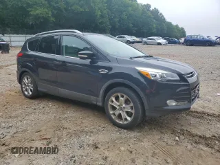 2015 Ford Escape Titanium with VIN 1FMCU0J96FUC00683, listed as a Copart auction lot 58345105 with 61,031 mi miles and Salvage title. Bid and sale history available at DreamBid. Image 4.