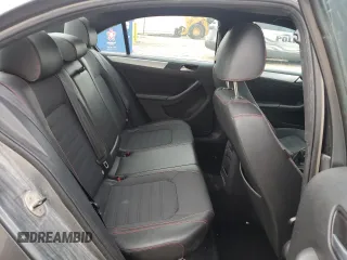 2014 Volkswagen Jetta GLI z VIN 3VW4T7AJ2EM245201, wystawiony jako Copart lot #64901935 z przebiegiem 147 799 mil mil oraz Czysty tytuł • Clean title. Historia ofert i sprzedaży dostępna na DreamBid. Obrazek 10.