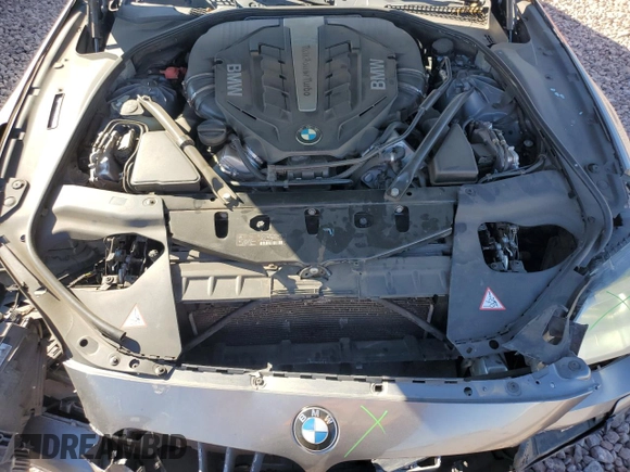 2014 BMW 6 Series 650i z VIN WBA6B2C57ED129034, wystawiony jako Copart lot #72774814 z przebiegiem 116 835 mil mil oraz Szkoda całkowita • Salvage title. Historia ofert i sprzedaży dostępna na DreamBid. Obrazek 11.
