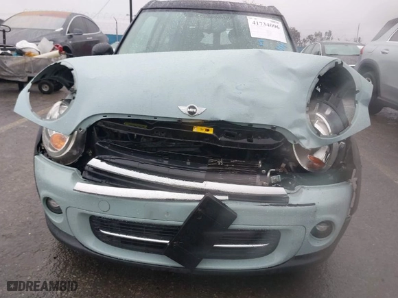 2013 MINI Cooper Clubman with VIN WMWZF3C56DT491108, listed as a IAAI auction lot 41734006 with 100,086 mi miles. Bid and sale history available at carsss.com. Image 6.