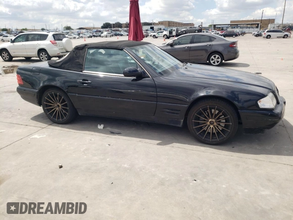 1999 Mercedes-Benz SL-Class with VIN WDBFA68F0XF182162, listed as a Copart auction lot 71390714 with 111,152 mi miles and Salvage Title. Bid and sale history available at carsss.com. Image 4.