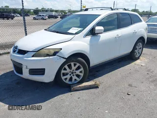 2009 Mazda CX-7 Sport with VIN JM3ER293690238184, listed as a IAAI auction lot 42131356 with 119,852 mi miles. Bid and sale history available at carsss.com. Image 2.