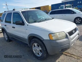 2001 Ford Escape XLT with VIN 1FMYU04151KF69759, listed as a IAAI auction lot 41997906 with 182,133 mi miles. Bid and sale history available at carsss.com. Image 1.