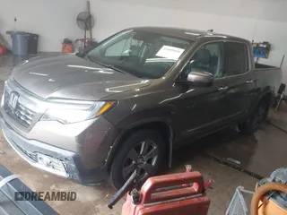 2020 Honda Ridgeline RTL-E with VIN 5FPYK3F75LB001516, listed as a IAAI auction lot 41605859 with 93,902 mi miles and . Bid and sale history available at DreamBid. Image 18.