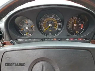 1989 Mercedes-Benz 560 SL with VIN WDBBA48D5KA103768, listed as a Copart auction lot 71965504 with 93,239 mi miles and Salvage Title. Bid and sale history available at DreamBid. Image 9.