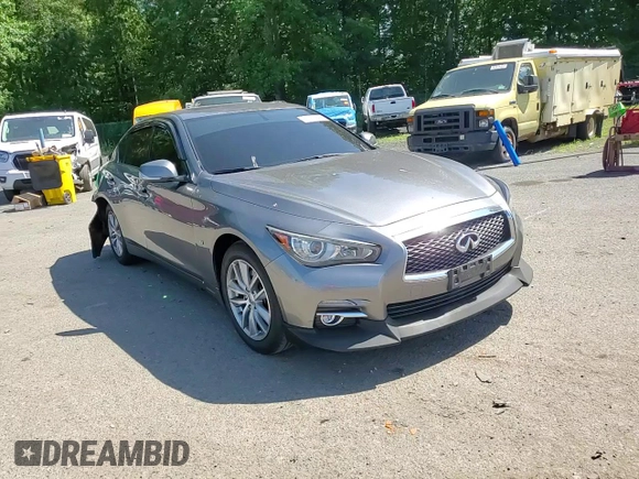 2015 Infiniti Q50 Premium z VIN JN1BV7ARXFM391291, wystawiony jako Copart lot #61765885 z przebiegiem 129 617 mil mil oraz Szkoda całkowita • Salvage title. Historia ofert i sprzedaży dostępna na DreamBid. Obrazek 13.
