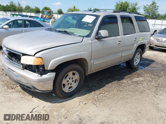 2004 Chevrolet Tahoe LT with VIN 1GNEK13Z64J292910, listed as a IAAI auction lot 42570170 with 309,679 mi miles and . Bid and sale history available at DreamBid. Image 2.