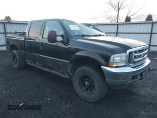 2004 Ford Super Duty F-250 XL with VIN 1FTNW21S24EA89210, listed as a IAAI auction lot 41219466 with 169,983 mi miles. Bid and sale history available at carsss.com. Image 1.