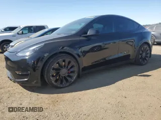 2022 Tesla Model Y Performance with VIN 7SAYGDEF1NF486218, listed as a Copart auction lot 63127435 with 99,302 mi miles and Salvage title. Bid and sale history available at DreamBid. Image 1.