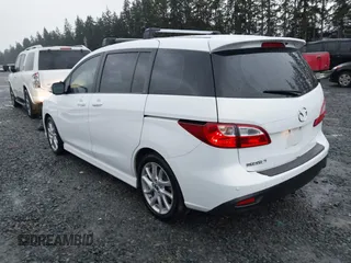 2015 Mazda Mazda5 Grand Touring with VIN JM1CW2DL6F0185594, listed as a IAAI auction lot 41470568 with 116,309 mi miles. Bid and sale history available at carsss.com. Image 3.