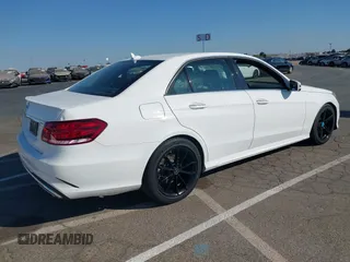 2014 Mercedes-Benz E 350 Sport with VIN WDDHF5KB9EA934467, listed as a IAAI auction lot 42773452 with 168,416 mi miles and . Bid and sale history available at DreamBid. Image 4.