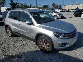 2012 Volkswagen Tiguan SE with VIN WVGAV7AX9CW607599, listed as a Copart auction lot 51214455 with 131,109 mi miles and Salvage Title. Bid and sale history available at DreamBid. Image 4.