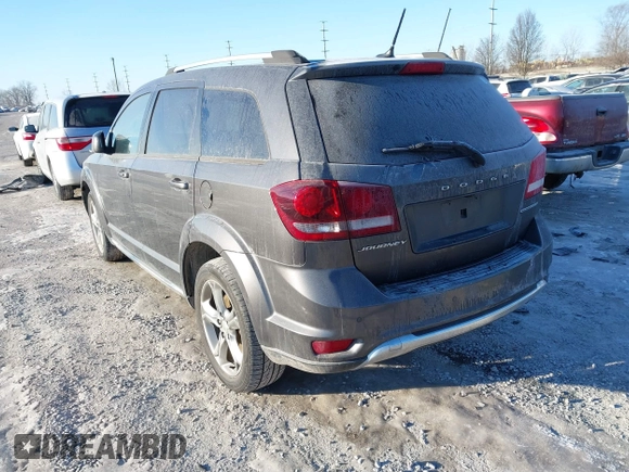 2016 Dodge Journey Crossroad Plus z VIN 3C4PDCGB0GT165975, wystawiony jako IAAI lot #41368904 z przebiegiem 101 835 mil mil oraz . Historia ofert i sprzedaży dostępna na DreamBid. Obrazek 3.