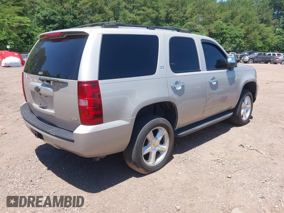 2007 Chevrolet Tahoe LTZ with VIN 1GNFK13037R265384, listed as a IAAI auction lot 42343911 with 162,688 mi miles and . Bid and sale history available at DreamBid. Image 4.