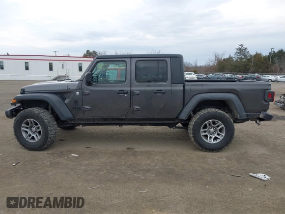 2020 Jeep Gladiator Sport S with VIN 1C6HJTAG8LL141535, listed as a IAAI auction lot 41673860 with 67,160 mi miles. Bid and sale history available at carsss.com. Image 14.