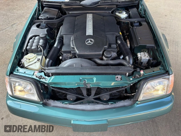 2002 Mercedes-Benz SL 500 with VIN WDBFA68F42F204673, listed as a Copart auction lot 56757525 with 32,967 mi miles and Clean title. Bid and sale history available at DreamBid. Image 5.