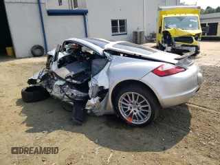 2006 Porsche Cayman S с VIN WP0AB29886U780284, выставлен на аукционе Copart как лот 65659094 с пробегом Не указан миль и Списание • Salvage title. История ставок и продаж доступна на DreamBid. Изображение 2.