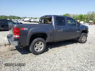 2010 GMC Sierra 1500 SLT with VIN 3GTRKWE38AG160082, listed as a Copart auction lot 52681465 with 251,363 mi miles and Salvage title. Bid and sale history available at DreamBid. Image 3.
