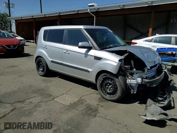 2012 Kia Soul + with VIN KNDJT2A67C7409358, listed as a Copart auction lot 52045175 with 106,908 mi miles and Salvage Title. Bid and sale history available at carsss.com. Image 11.