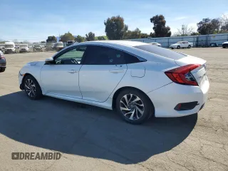2016 Honda Civic EX with VIN 19XFC2F73GE204858, listed as a Copart auction lot 45976235 with 126,904 mi miles and Salvage Title. Bid and sale history available at DreamBid. Image 2.