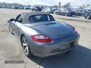 2007 Porsche Boxster with VIN WP0CA29857U711209, listed as a IAAI auction lot 41550294 with 86,012 mi miles. Bid and sale history available at carsss.com. Image 3.
