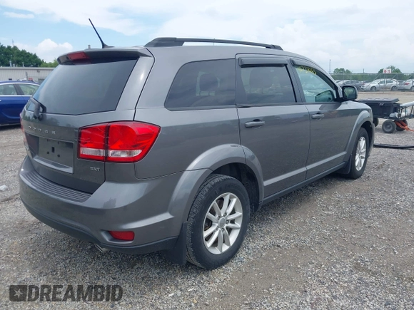 2013 Dodge Journey SXT with VIN 3C4PDCBG8DT517733, listed as a IAAI auction lot 42737063 with 67,363 mi miles and . Bid and sale history available at DreamBid. Image 4.