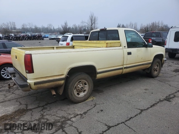 1997 GMC Sierra 1500 with VIN 1GTGC24R4VZ546832, listed as a Copart auction lot 87954535 with 411,941 mi miles and Clean Title. Bid and sale history available at DreamBid. Image 3.