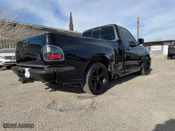 2004 Ford F-150 Heritage Lightning with VIN 2FTRF07324CA40987, listed as a Copart auction lot 88455875 with 1 mi miles and Salvage Title. Bid and sale history available at carsss.com. Image 4.