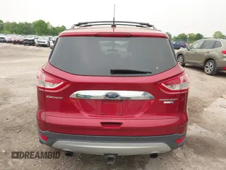 2015 Ford Escape Titanium with VIN 1FMCU9J96FUC02177, listed as a IAAI auction lot 42312928 with 100,716 mi miles and . Bid and sale history available at DreamBid. Image 16.