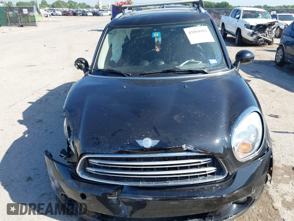 2015 MINI Countryman with VIN WMWZB3C54FWM33074, listed as a IAAI auction lot 42094992 with 86,704 mi miles and . Bid and sale history available at DreamBid. Image 13.