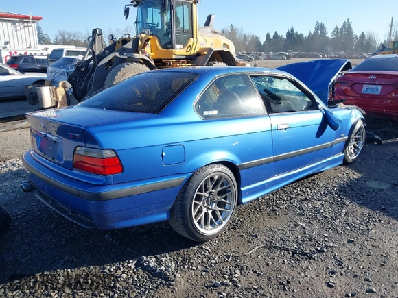 1999 BMW 3 Series M3 with VIN WBSBG9330XEY83862, listed as a IAAI auction lot 41486946 with 1 mi miles. Bid and sale history available at carsss.com. Image 4.