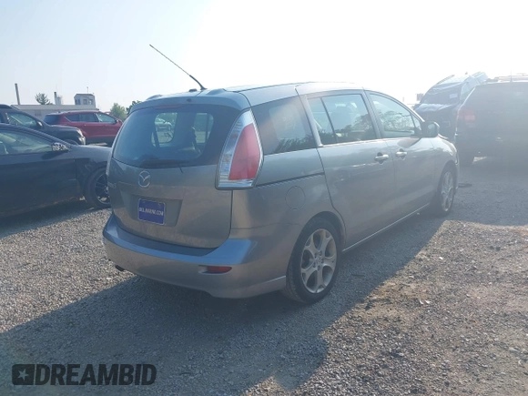 2010 Mazda 5 Sport with VIN JM1CR2W32A0385045, listed as a IAAI auction lot 42451448 with 127,762 mi miles and . Bid and sale history available at DreamBid. Image 4.