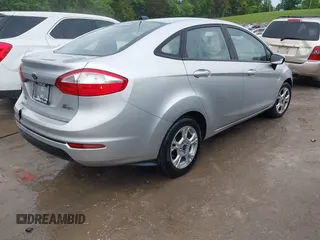 2015 Ford Fiesta SE with VIN 3FADP4BJ4FM204354, listed as a IAAI auction lot 42117676 with 146,110 mi miles and . Bid and sale history available at DreamBid. Image 4.