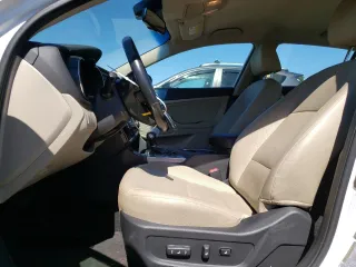 2015 Kia Optima Hybrid EX with VIN KNAGN4AD5F5090800, listed as a Copart auction lot 70700424 with 91,351 mi miles and Salvage Title. Bid and sale history available at carsss.com. Image 7.