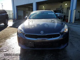 2019 Kia Stinger with VIN KNAE15LAXK6043536, listed as a Copart auction lot 42778575 with 101,200 mi miles and Salvage Title. Bid and sale history available at DreamBid. Image 5.