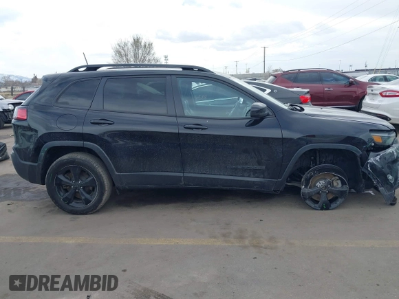 2020 Jeep Cherokee Altitude with VIN 1C4PJMLX9LD634920, listed as a IAAI auction lot 41892720 with 75,388 mi miles and . Bid and sale history available at DreamBid. Image 13.